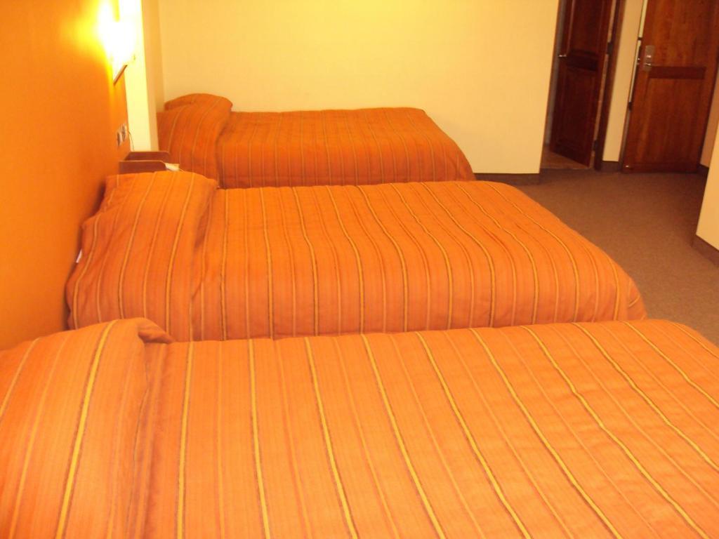 Mosoq Inn Puno Habitación foto